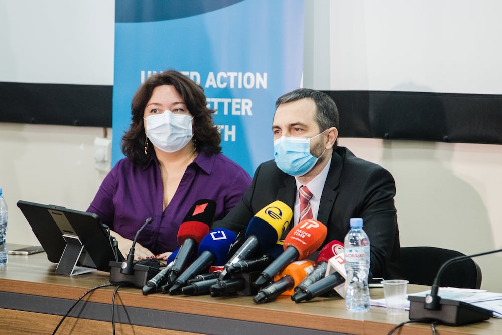 Silviu Domente (right, WHO Representative and Head of WHO Country Office to Georgia) and Tamar Kvaratskhelia (left, Communication Consultant) give a speech at a press conference for the arrival of the COVID-19 vaccines