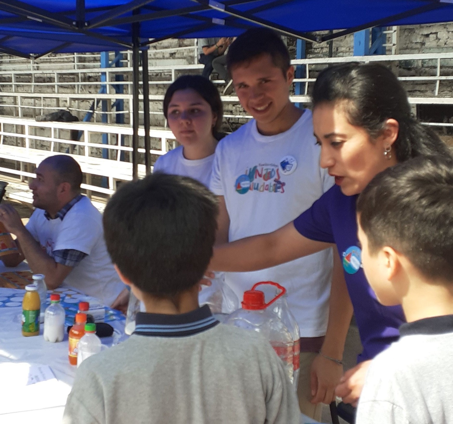 children and adults with drinks